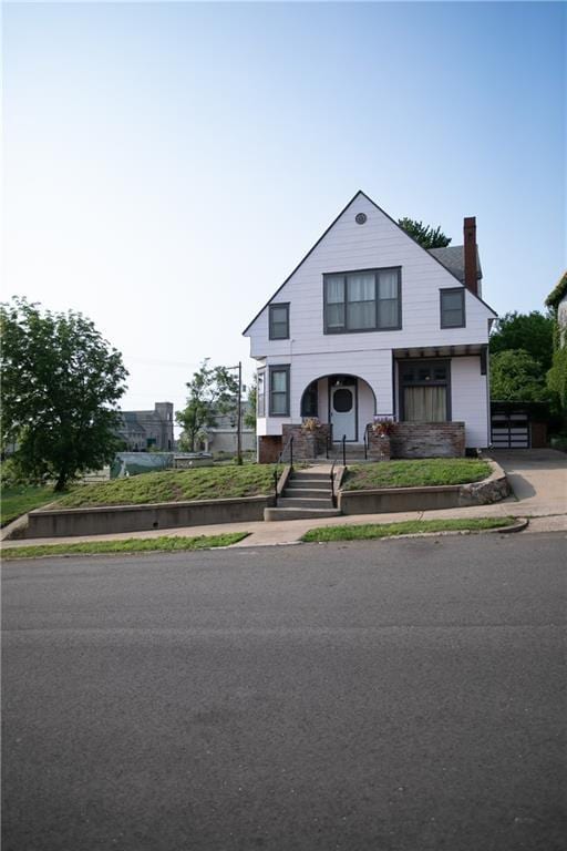 1017 Angelique St, Saint Joseph, MO 64501 - view of front of house featuring a chimney