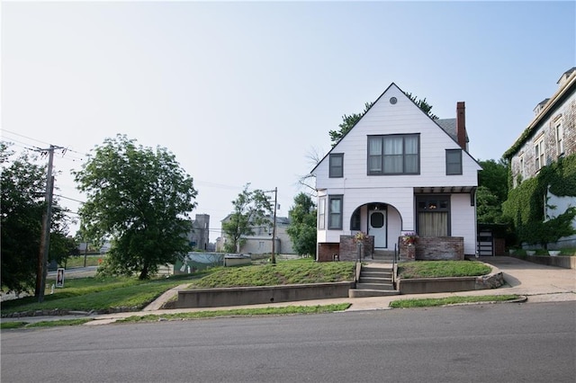 1017 Angelique St, Saint Joseph, MO 64501 - view of front of property featuring driveway and a chimney