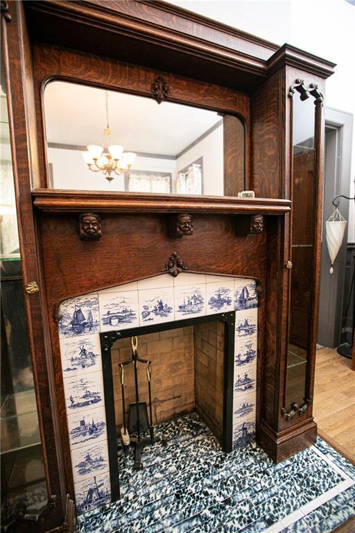 1017 Angelique St, Saint Joseph, MO 64501 - detailed view of a chandelier and wood finished floors