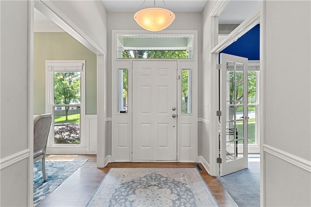 9816 W 132nd Ter, Overland Park, KS 66213 - foyer entrance featuring wood finished floors and wainscoting