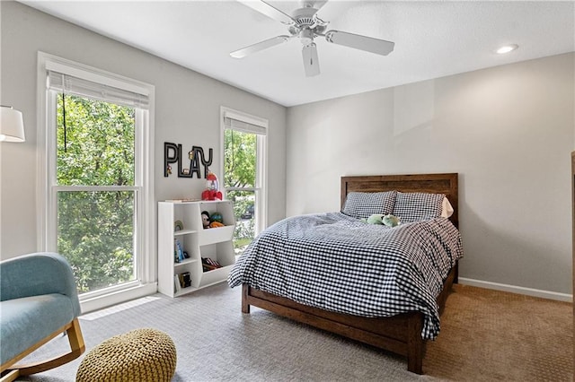 9816 W 132nd Ter, Overland Park, KS 66213 - bedroom with carpet floors, ceiling fan, and baseboards