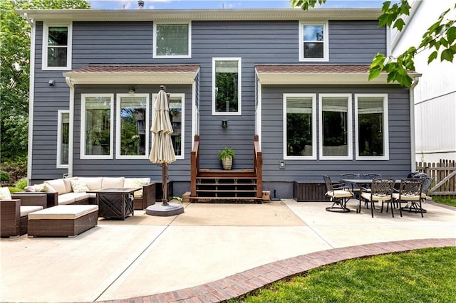 9816 W 132nd Ter, Overland Park, KS 66213 - rear view of property featuring an outdoor hangout area and a patio area