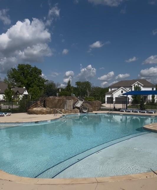 2055 NW Obrien Rd, Lees Summit, MO 64081 - community pool with a water slide