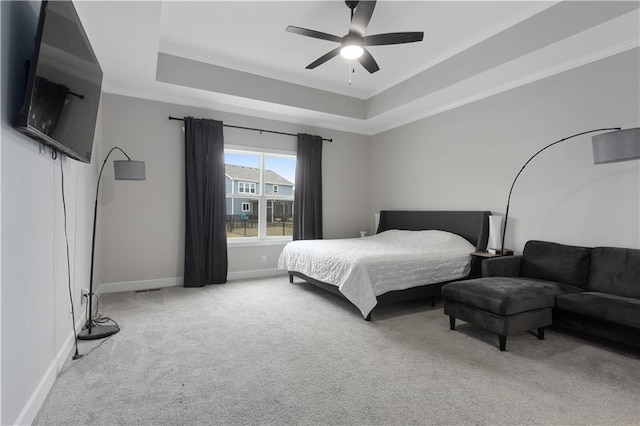 2055 NW Obrien Rd, Lees Summit, MO 64081 - bedroom featuring carpet, a raised ceiling, crown molding, baseboards, and a ceiling fan