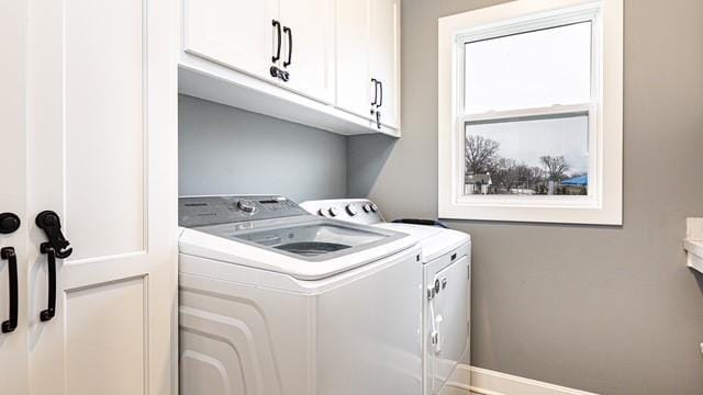2055 NW Obrien Rd, Lees Summit, MO 64081 - laundry area with separate washer and dryer, cabinet space, and baseboards
