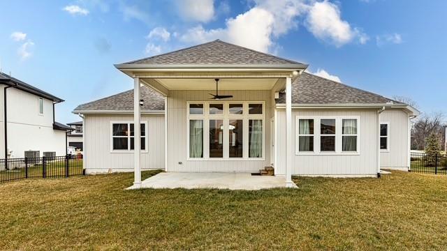 2055 NW Obrien Rd, Lees Summit, MO 64081 - back of house with ceiling fan, a patio, and a shingled roof