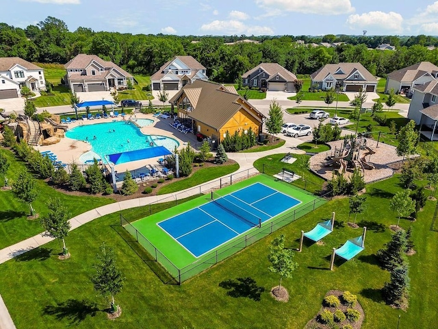 2055 NW Obrien Rd, Lees Summit, MO 64081 - aerial perspective of suburban area featuring a pool area