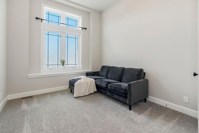 2055 NW Obrien Rd, Lees Summit, MO 64081 - sitting room featuring baseboards and carpet flooring