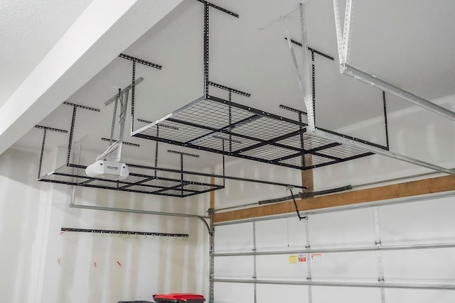2055 NW Obrien Rd, Lees Summit, MO 64081 - garage featuring a garage door opener