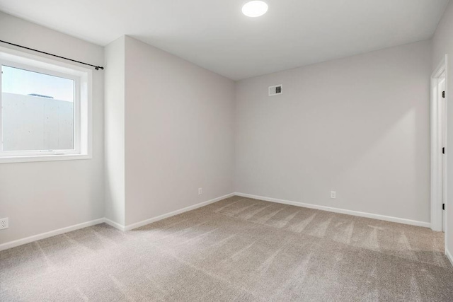 2055 NW Obrien Rd, Lees Summit, MO 64081 - carpeted spare room featuring baseboards