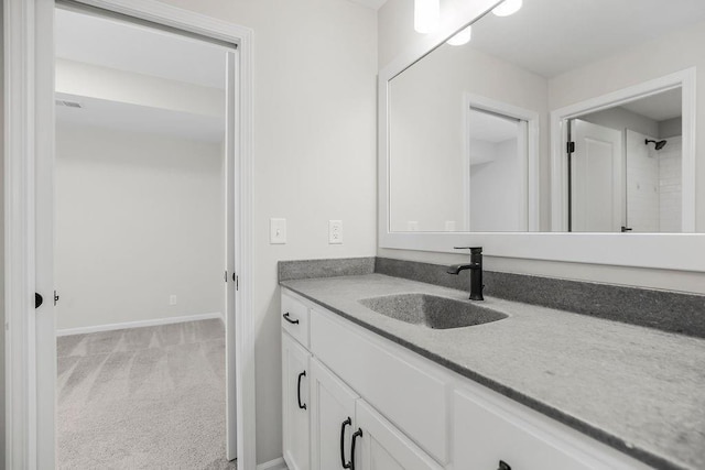 2055 NW Obrien Rd, Lees Summit, MO 64081 - bathroom featuring vanity and baseboards