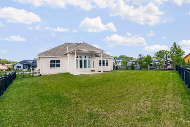 2055 NW Obrien Rd, Lees Summit, MO 64081 - rear view of property featuring a fenced backyard, a patio, and roof with shingles