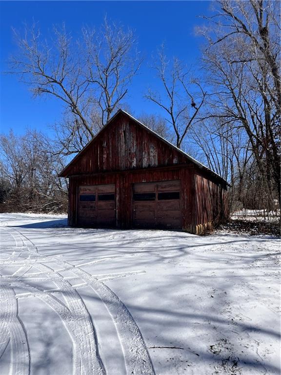 519 N Warren St, Warrensburg, MO 64093 - snow covered garage with a garage