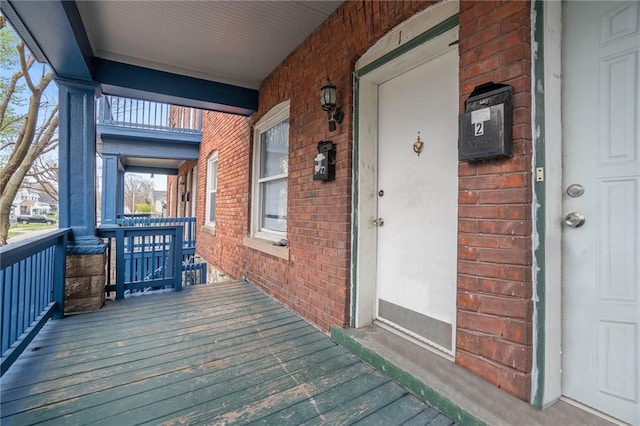 412 Montgall Ave, Kansas City, MO 64124 - view of wooden porch