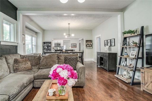5818 W 75th St, Prairie Village, KS 66208 - living area featuring dark wood-style floors and a chandelier