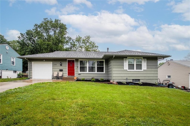 12500 E 48th Ter S, Independence, MO 64055 - view of front of house featuring concrete driveway, an attached garage, and a front lawn