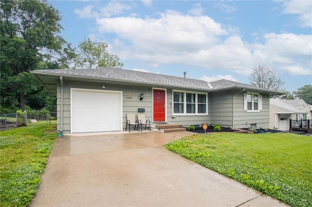 12500 E 48th Ter S, Independence, MO 64055 - view of front facade featuring an attached garage and driveway