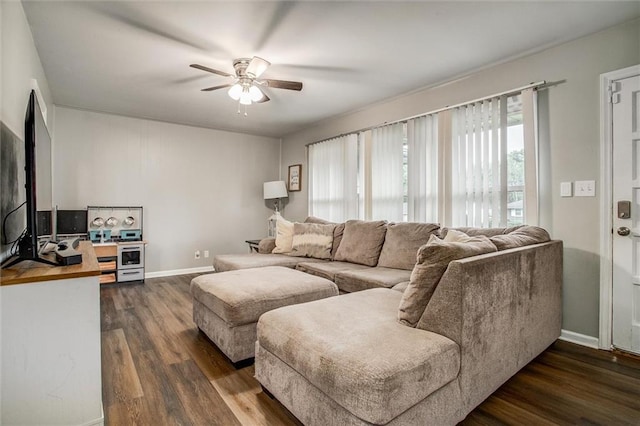 12500 E 48th Ter S, Independence, MO 64055 - living room with a ceiling fan, dark wood-style flooring, and baseboards