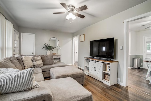 12500 E 48th Ter S, Independence, MO 64055 - living room with a ceiling fan, dark wood-type flooring, and baseboards