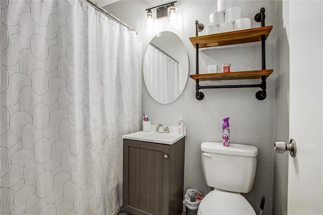 12500 E 48th Ter S, Independence, MO 64055 - bathroom with toilet, vanity, and a shower with curtain