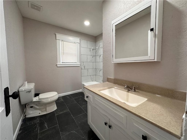 9400 E 17th St S, Independence, MO 64052 - full bathroom with toilet, vanity, baseboards, bathing tub / shower combination, and marble finish flooring