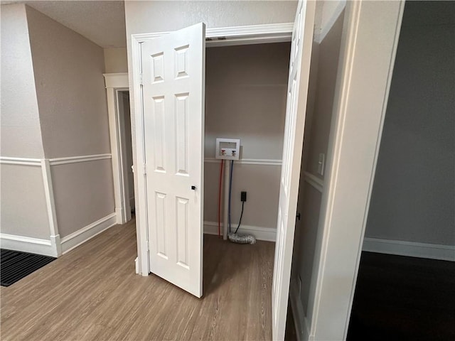9400 E 17th St S, Independence, MO 64052 - corridor with wood finished floors and baseboards