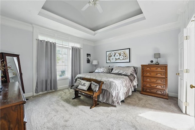 1040 Silverleaf Ln, Liberty, MO 64068 - bedroom featuring carpet flooring, ornamental molding, a tray ceiling, a ceiling fan, and baseboards