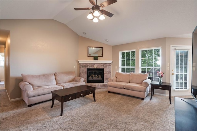 3100 Clarendon Rd, Sedalia, MO 65301 - living room featuring lofted ceiling, carpet floors, a ceiling fan, and a fireplace