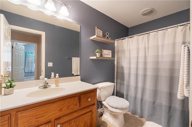 3100 Clarendon Rd, Sedalia, MO 65301 - bathroom with vanity, toilet, tile patterned floors, and curtained shower
