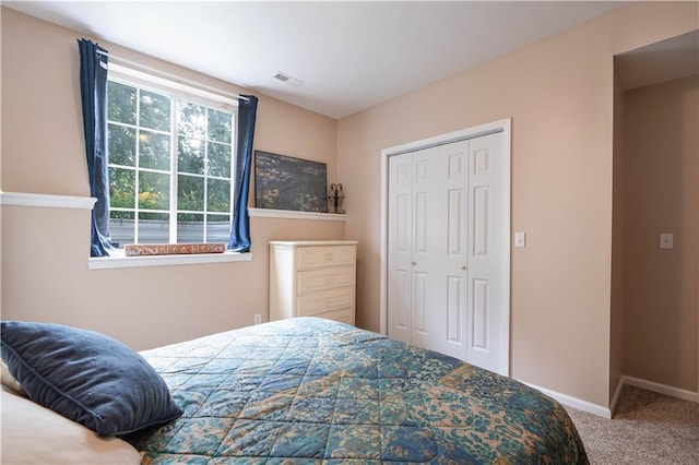 3100 Clarendon Rd, Sedalia, MO 65301 - carpeted bedroom featuring a closet and baseboards