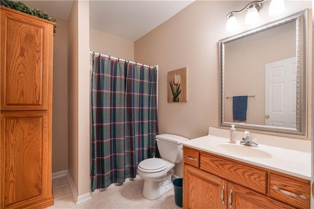 3100 Clarendon Rd, Sedalia, MO 65301 - full bath featuring tile patterned flooring, toilet, vanity, and a shower with curtain