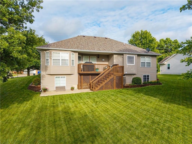 3100 Clarendon Rd, Sedalia, MO 65301 - back of property with a yard, stairway, a patio area, and a wooden deck