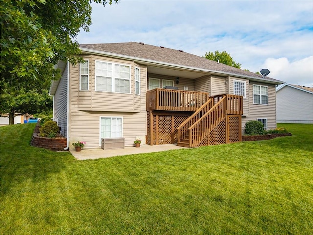 3100 Clarendon Rd, Sedalia, MO 65301 - rear view of house with a yard, stairway, a deck, a patio, and a shingled roof