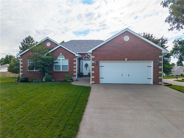 3100 Clarendon Rd, Sedalia, MO 65301 - view of front facade featuring driveway, brick siding, a front lawn, and an attached garage
