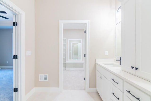 16729 Pinehurst Dr, Basehor, KS 66007 - bathroom featuring vanity and baseboards
