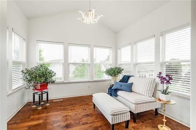23713 W 88th St, Lenexa, KS 66227 - sitting room with plenty of natural light, a chandelier, lofted ceiling, wood finished floors, and baseboards