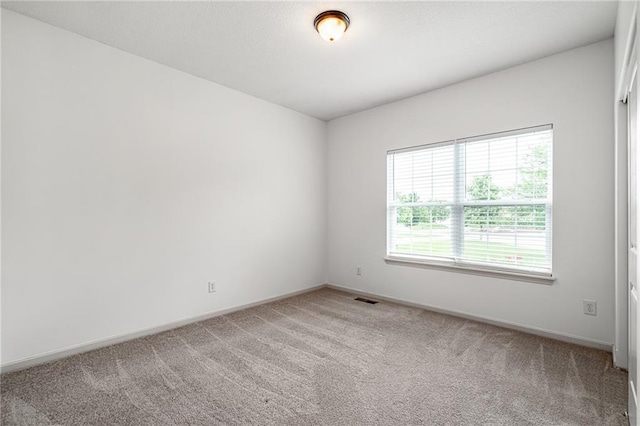 23713 W 88th St, Lenexa, KS 66227 - spare room with light colored carpet and baseboards