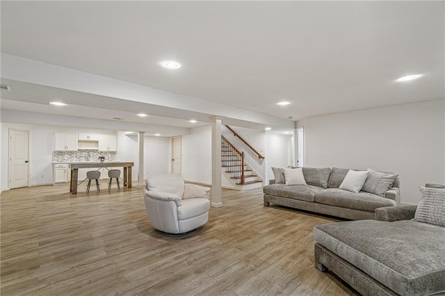 23713 W 88th St, Lenexa, KS 66227 - living area with light wood-type flooring, stairs, and recessed lighting