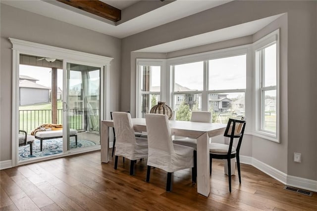 15670 W 165th Ter, Olathe, KS 66062 - dining space featuring baseboards and hardwood / wood-style floors