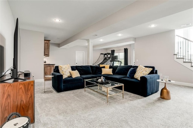15670 W 165th Ter, Olathe, KS 66062 - carpeted living room featuring baseboards, stairs, and recessed lighting