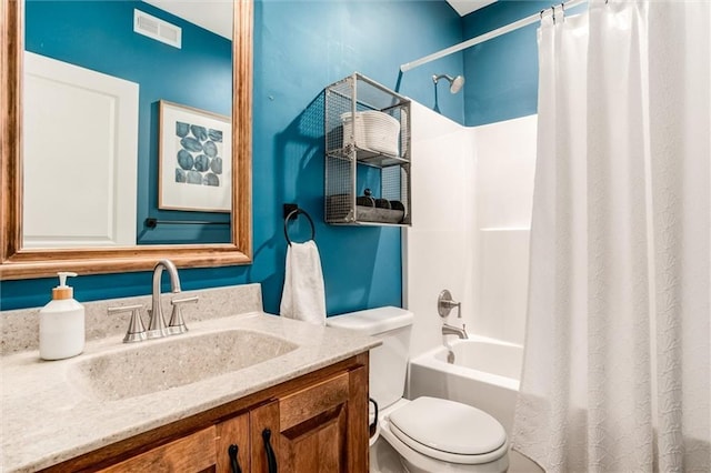 15670 W 165th Ter, Olathe, KS 66062 - bathroom with toilet, vanity, and shower / bath combo with shower curtain