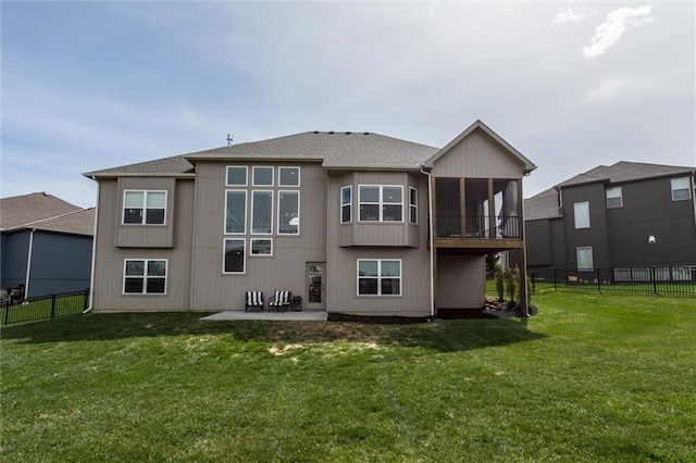 15670 W 165th Ter, Olathe, KS 66062 - back of property with a patio, a sunroom, and roof with shingles