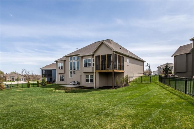 15670 W 165th Ter, Olathe, KS 66062 - rear view of property with a sunroom and a patio area