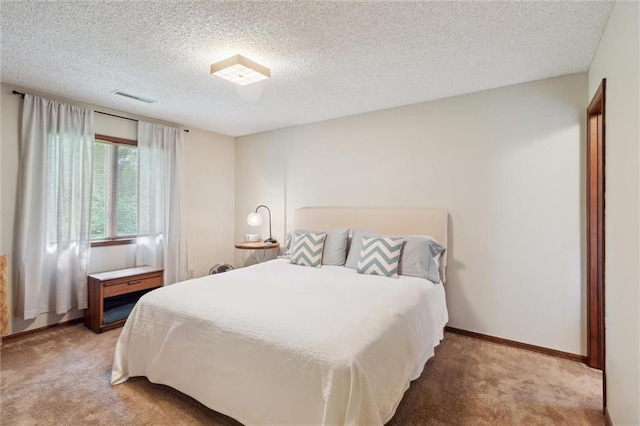 501 Taylor Rd, Independence, KS 67301 - bedroom featuring light carpet and a textured ceiling