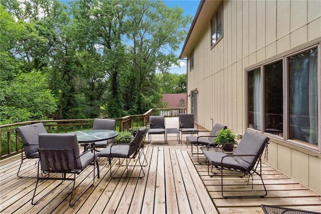 501 Taylor Rd, Independence, KS 67301 - wooden terrace featuring outdoor dining space and outdoor lounge area
