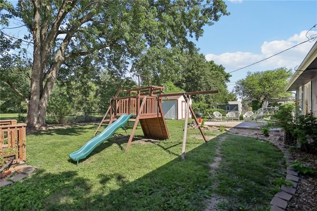 1022 N Davis Rd, Ottawa, KS 66067 - view of jungle gym with a storage shed and a yard