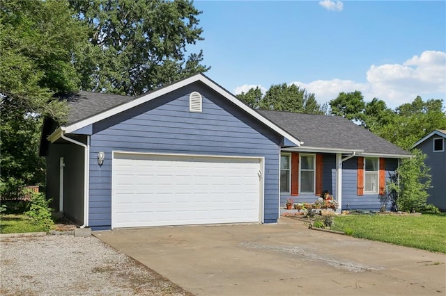 1022 N Davis Rd, Ottawa, KS 66067 - single story home featuring an attached garage, concrete driveway, and roof with shingles