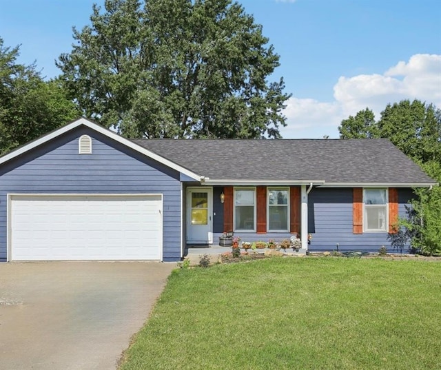 1022 N Davis Rd, Ottawa, KS 66067 - ranch-style home featuring driveway, a front yard, a garage, and roof with shingles