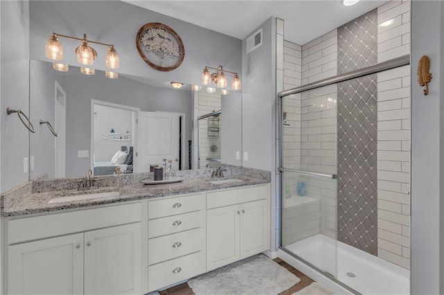 1302 N 159th St, Basehor, KS 66007 - bathroom with double vanity, a stall shower, and ensuite bath