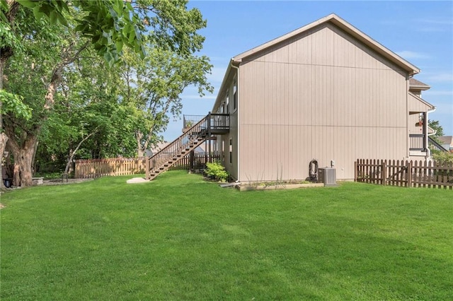 1302 N 159th St, Basehor, KS 66007 - view of side of home featuring stairs and central air condition unit